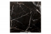 Glossy black marble with golden and white veins