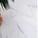 Marmo Statuario con venature grigie